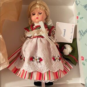 Madame Alexander Doll in Red, Green, and White Dress